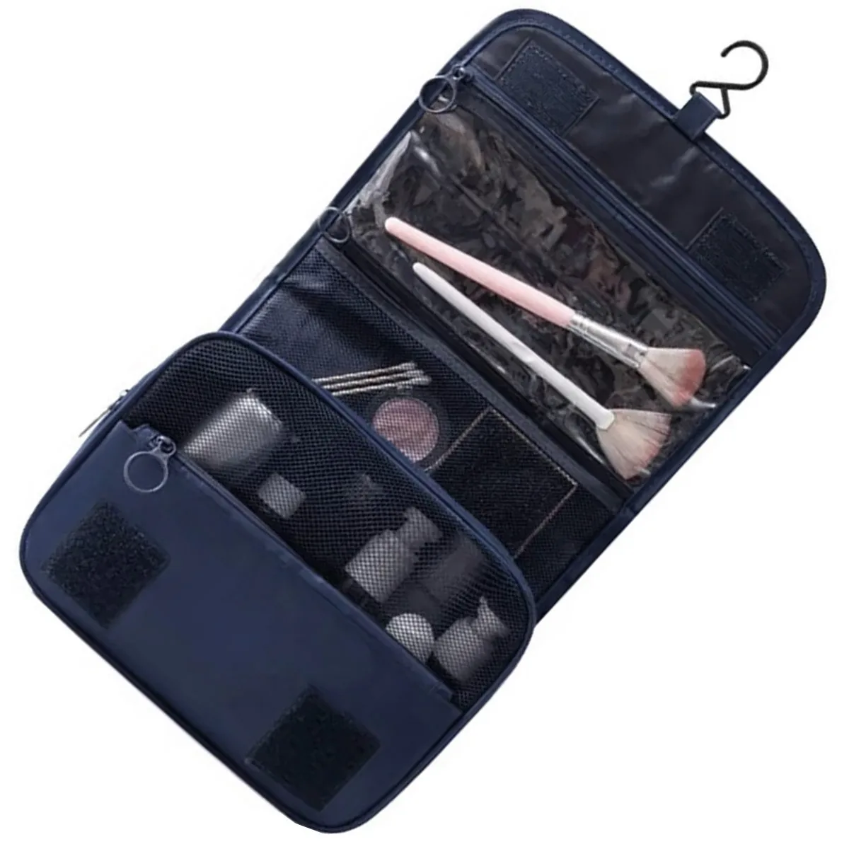 Geantă de cosmetice albastră desfăcută complet vertical, cu pensule de machiaj în buzunarul PVC transparent superior.